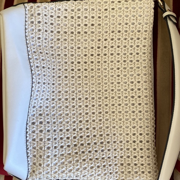 Olsen Bag.  Beautiful detail in front and amazing bag.  Lots of storage inside. - Picture 7 of 7